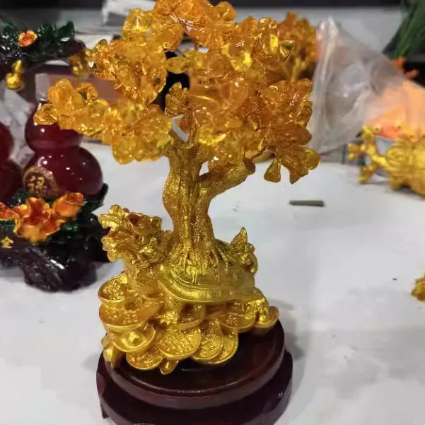 Citrine-coloured resin turtle money tree ornament with Chinese design style.