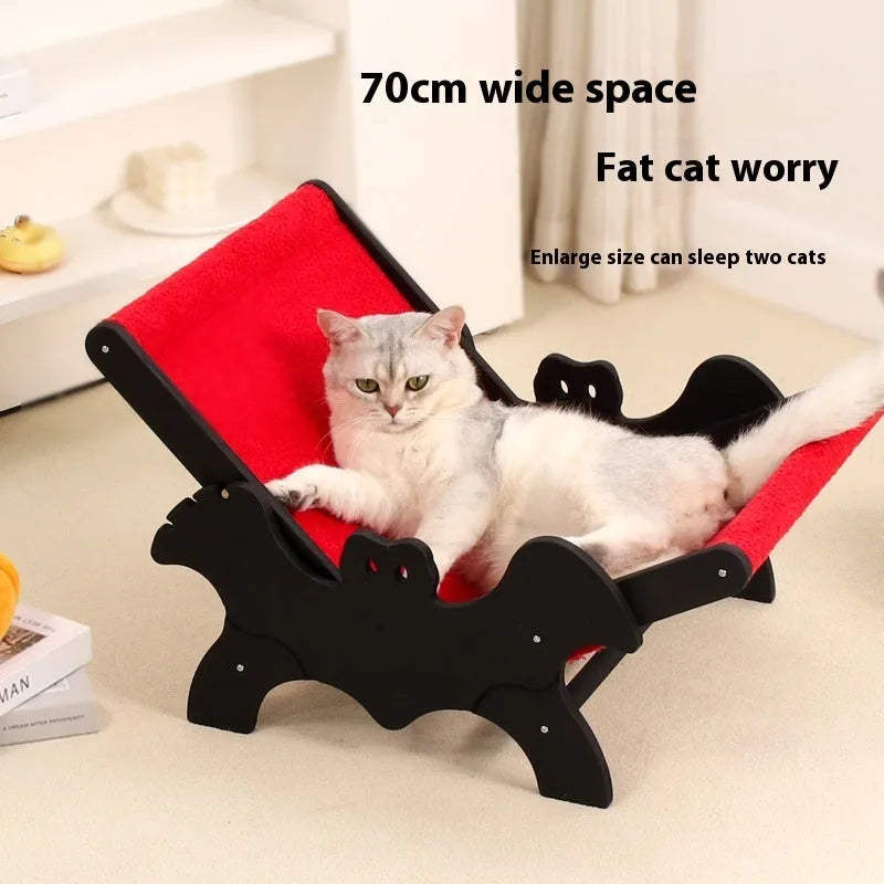 Wooden cat recliner bed with black and red Halloween colour theme