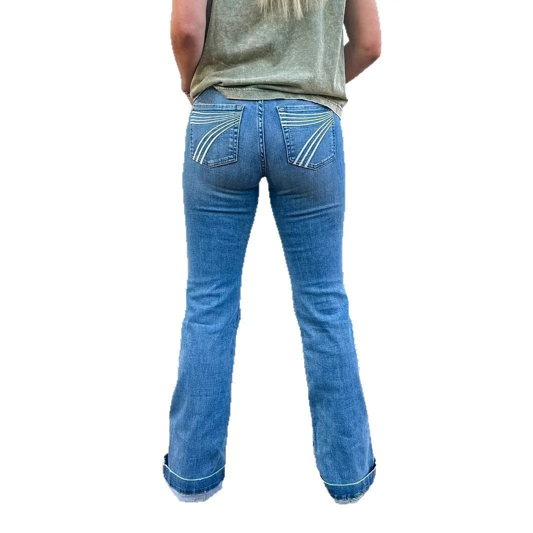 Women's slim fit mid-waist jeans with slightly flared silhouette and embroidery detail
