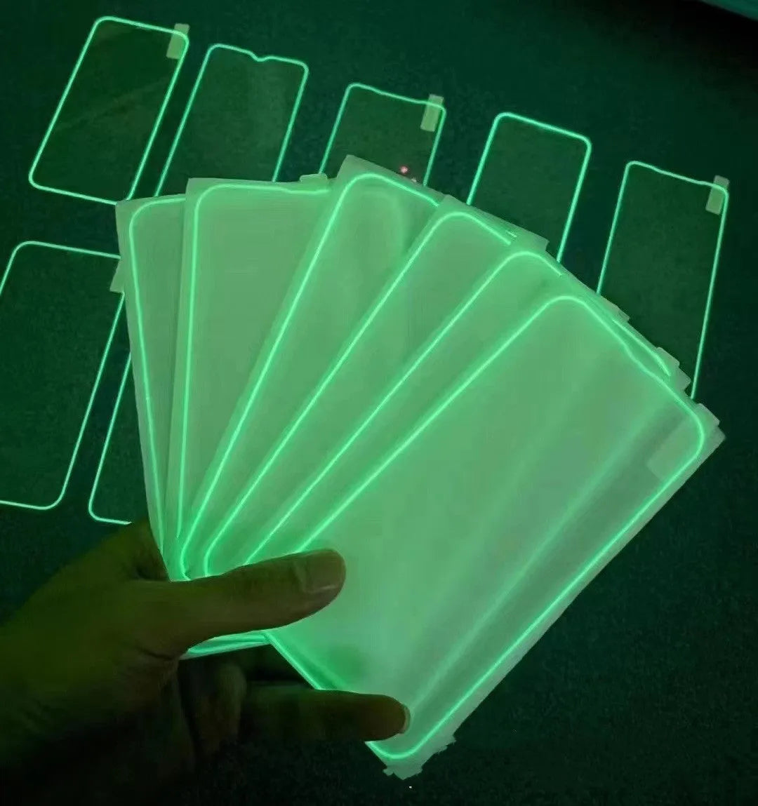 Fluorescent luminous tempered glass screen protector for iPhone in pink, yellow, green, blue, and grass green colours.