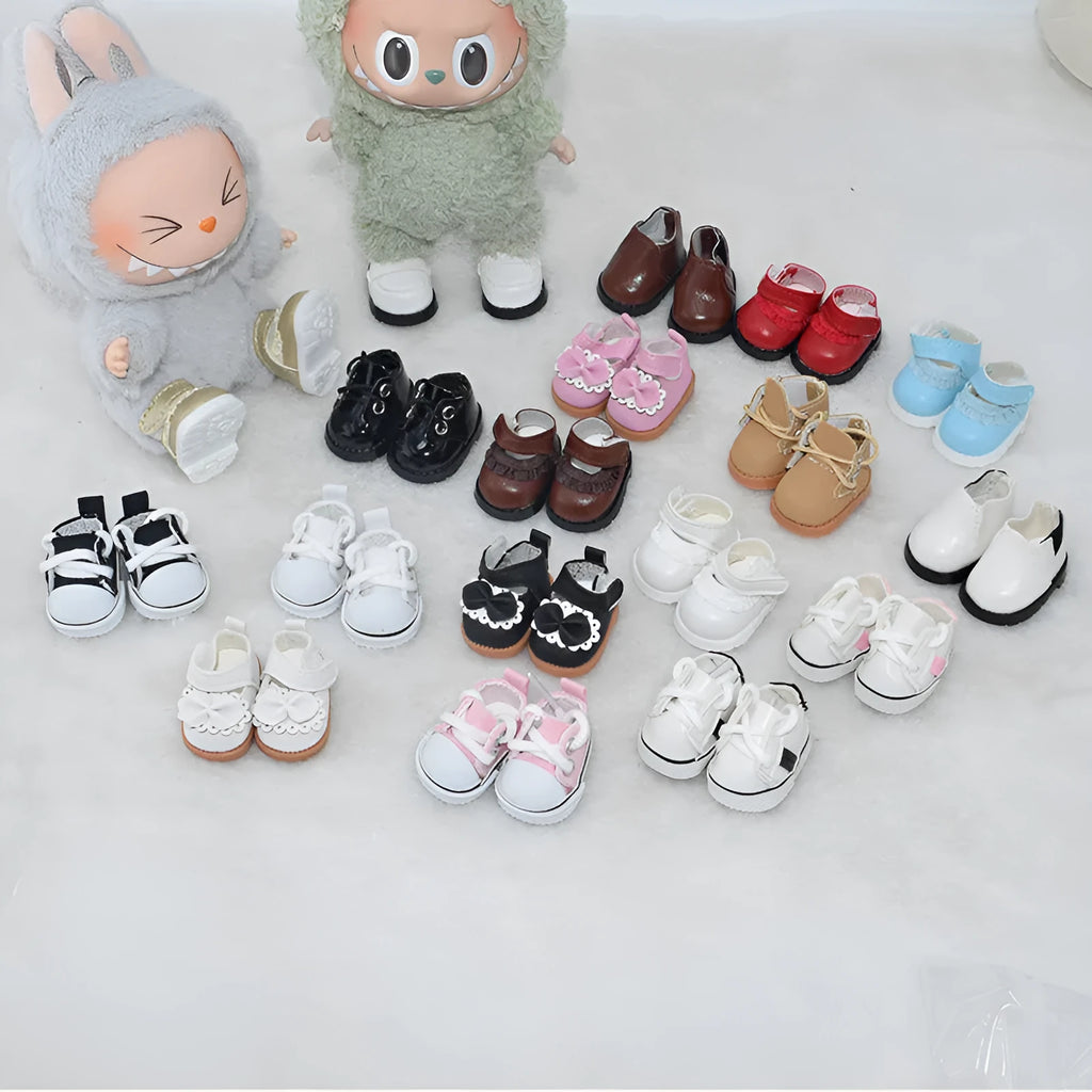 A pair of polyurethane leather replacement shoes for a 17cm tall fashion doll, shown in a colour option.