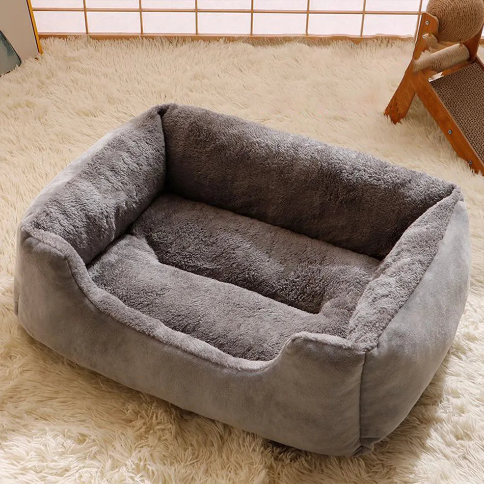 Short plush cat bed for pets shown in one of five colours and available in five sizes.