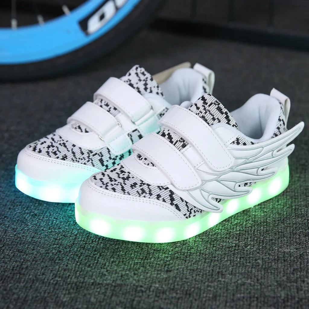 Children's plum red and white LED light-up sneakers with colourful luminous soles and USB charging port.