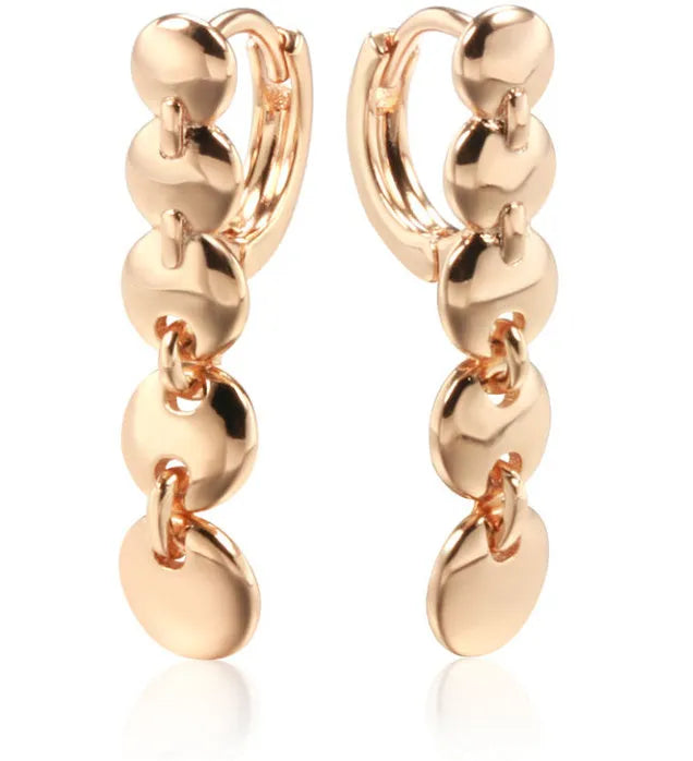 Gold tone retro long circle earrings with woven texture on a copper base.