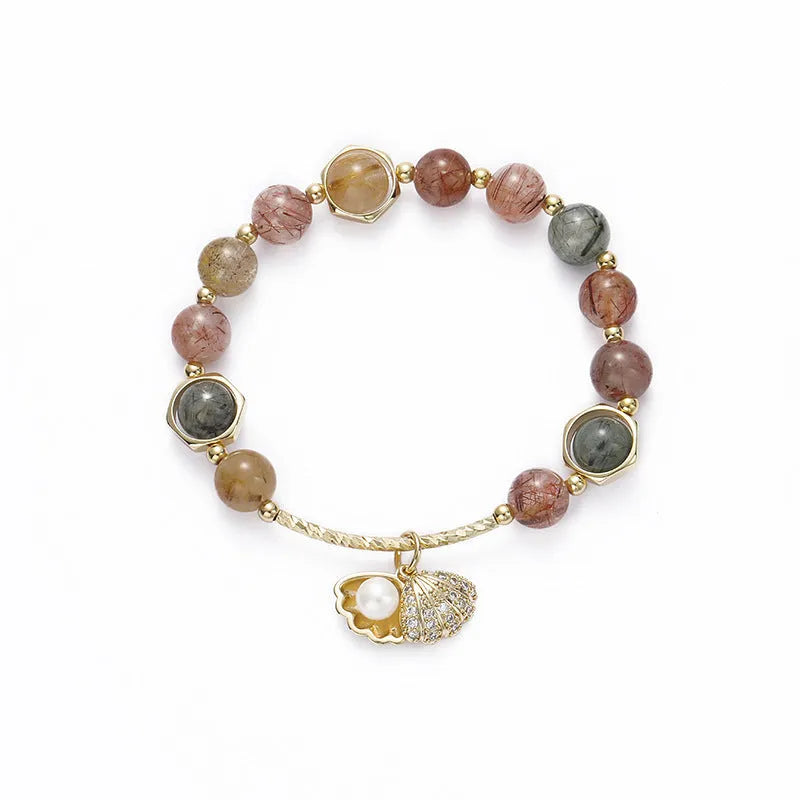 A women's crystal bracelet with colourful hair crystal shells and a red sealant flower shell on an electroplated band.