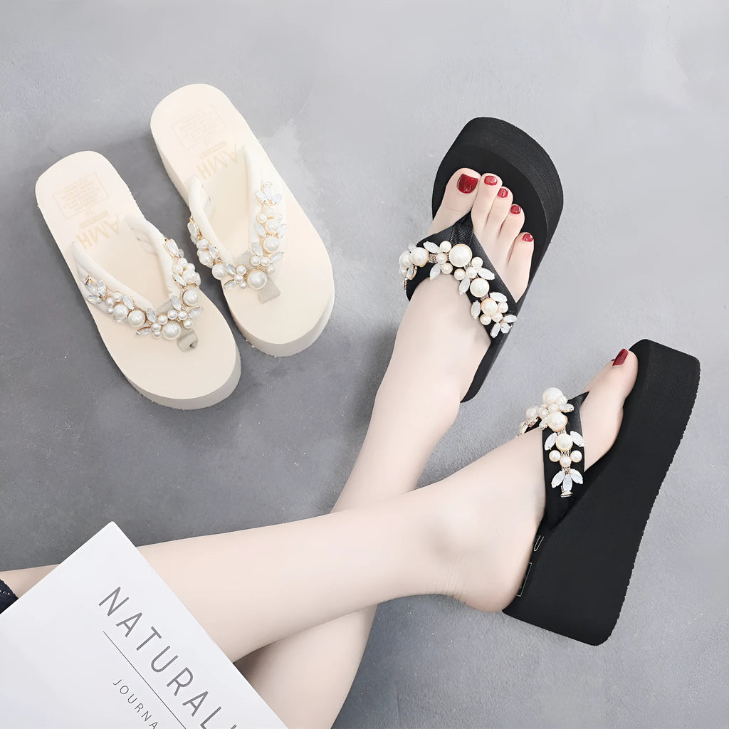 Women's high-heeled flip flops in beige and black with cotton cloth upper, showing casual summer sandal design
