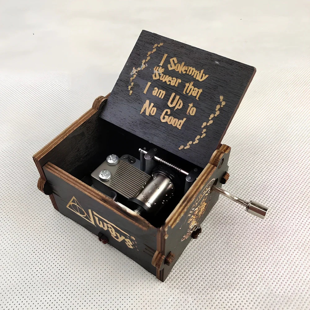 Antique boxwood music box with hand crank and yin carved Spirited Away landscape flowers, 10 cm tall wooden decoration