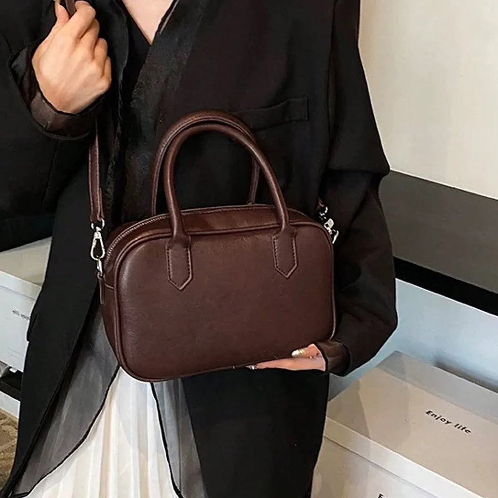 Retro square messenger bag in black with single shoulder strap