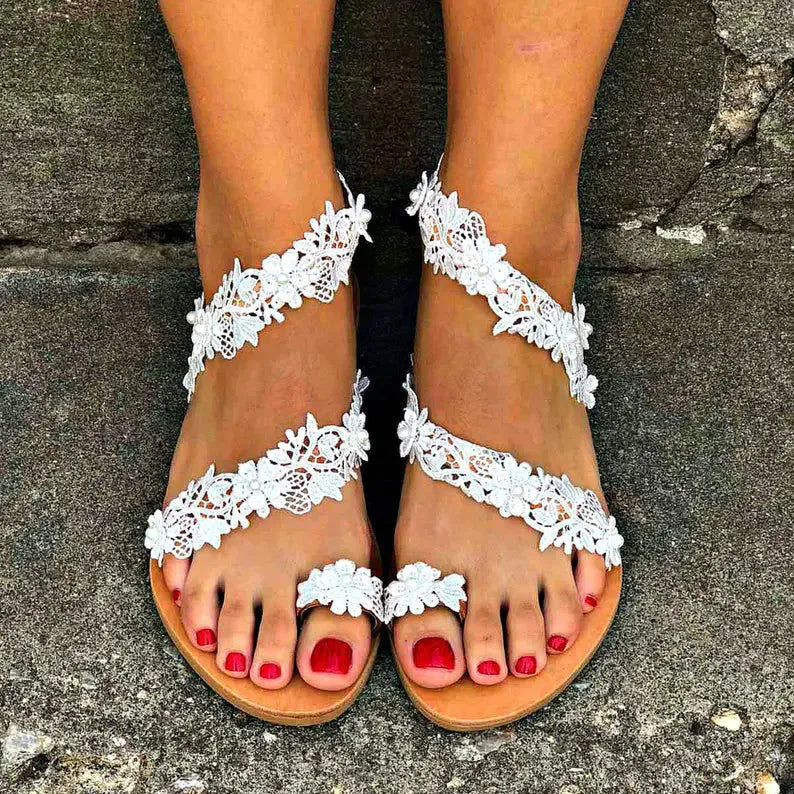 White women's flat sandals with rhinestone flower decoration and slip-on design