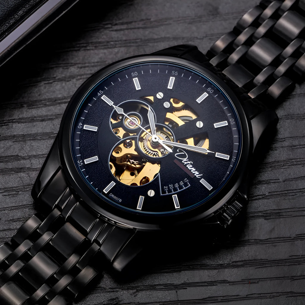 Mechanical automatic watch with 42mm stainless steel case, black dial, mineral glass, and steel bracelet on light background