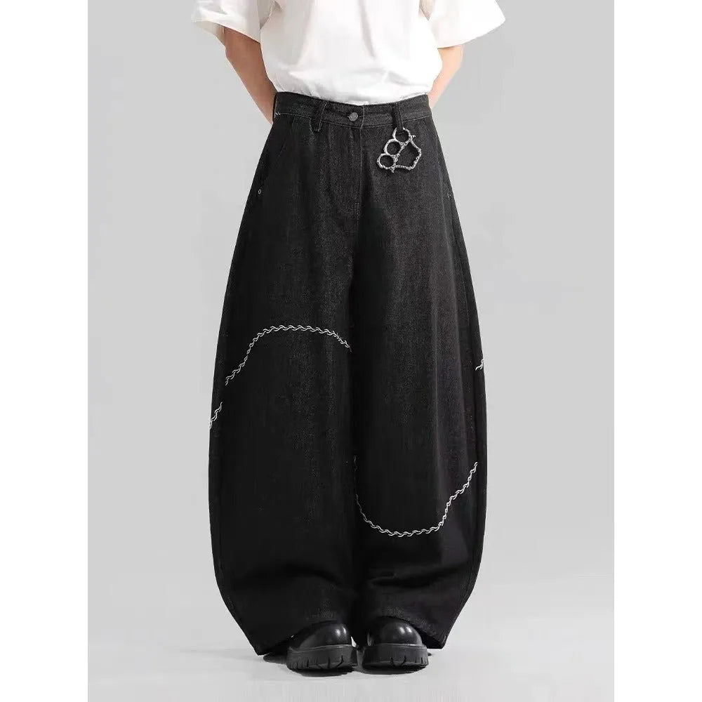 Black straight-leg polyester denim trousers with a zip fly and micro-elastic waistband.