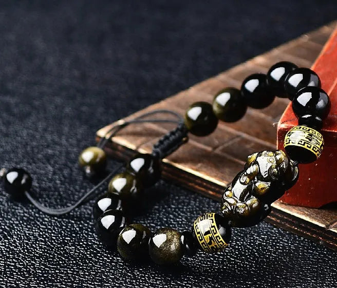 Hand-woven golden obsidian Pi Xiu bracelet with Chinese zodiac design