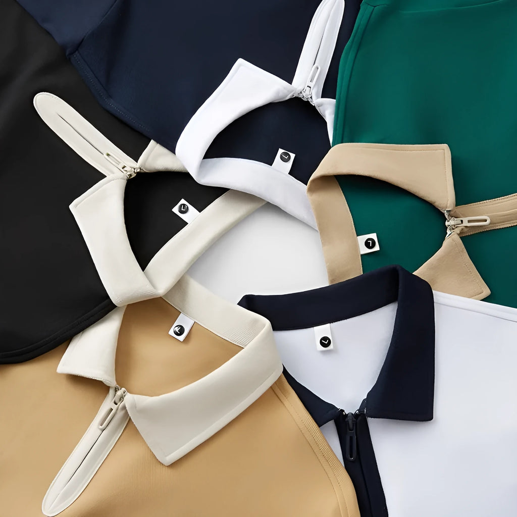 Loose fit navy blue zip and lapel polo shirt on a hanger