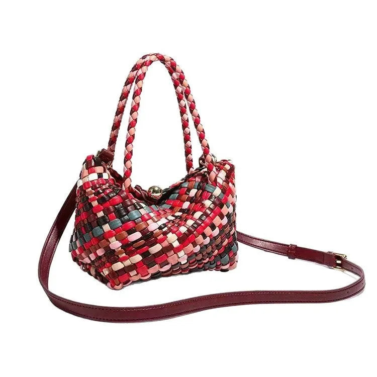 Women's woven PU leather shoulder bag showing handmade detailing and 18x11x14cm dimensions