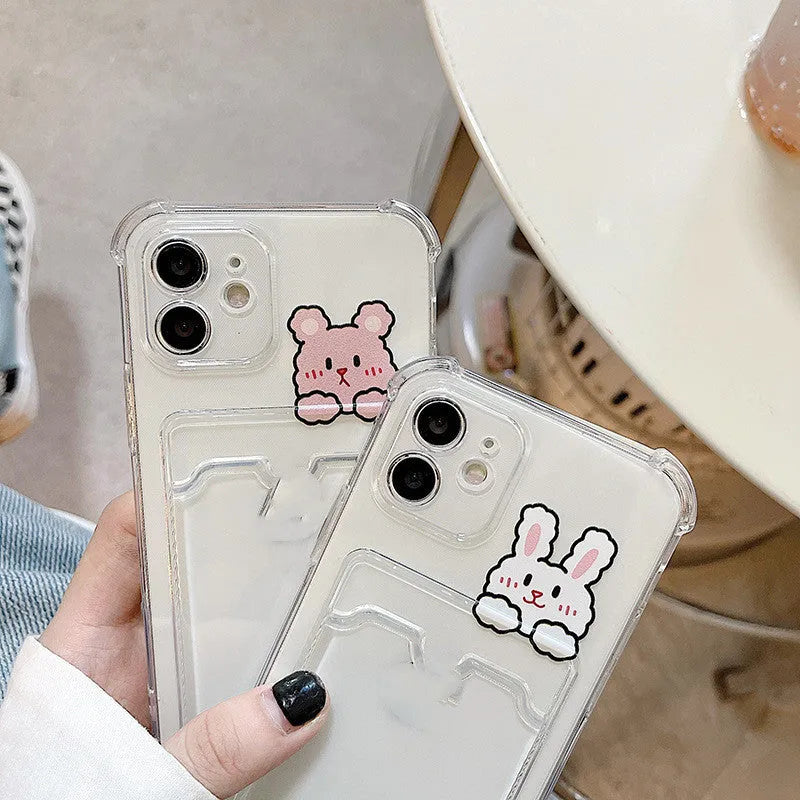 Clear cartoon-design iPhone case with a built-in card holder slot on the back.