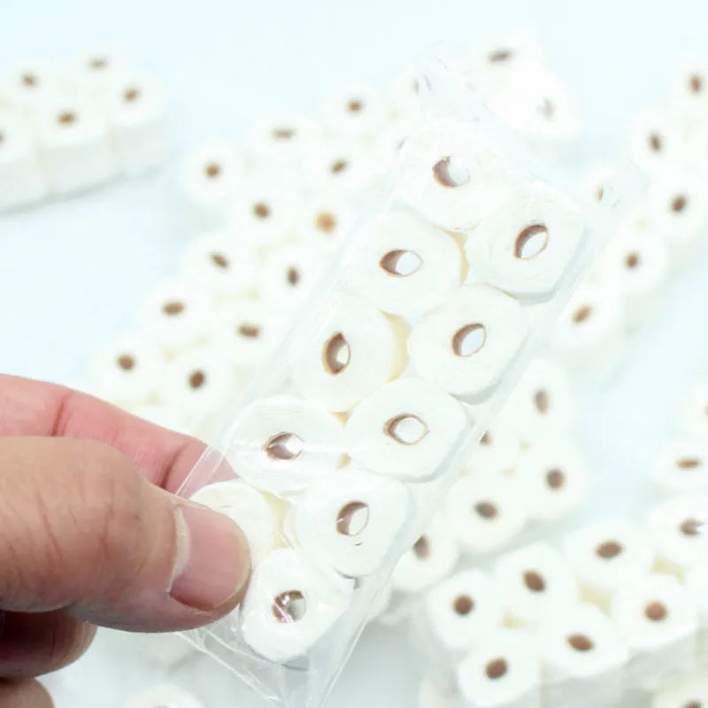 Small white paper model of a tissue roll for dollhouse play, showing 30mm width and 80mm height.