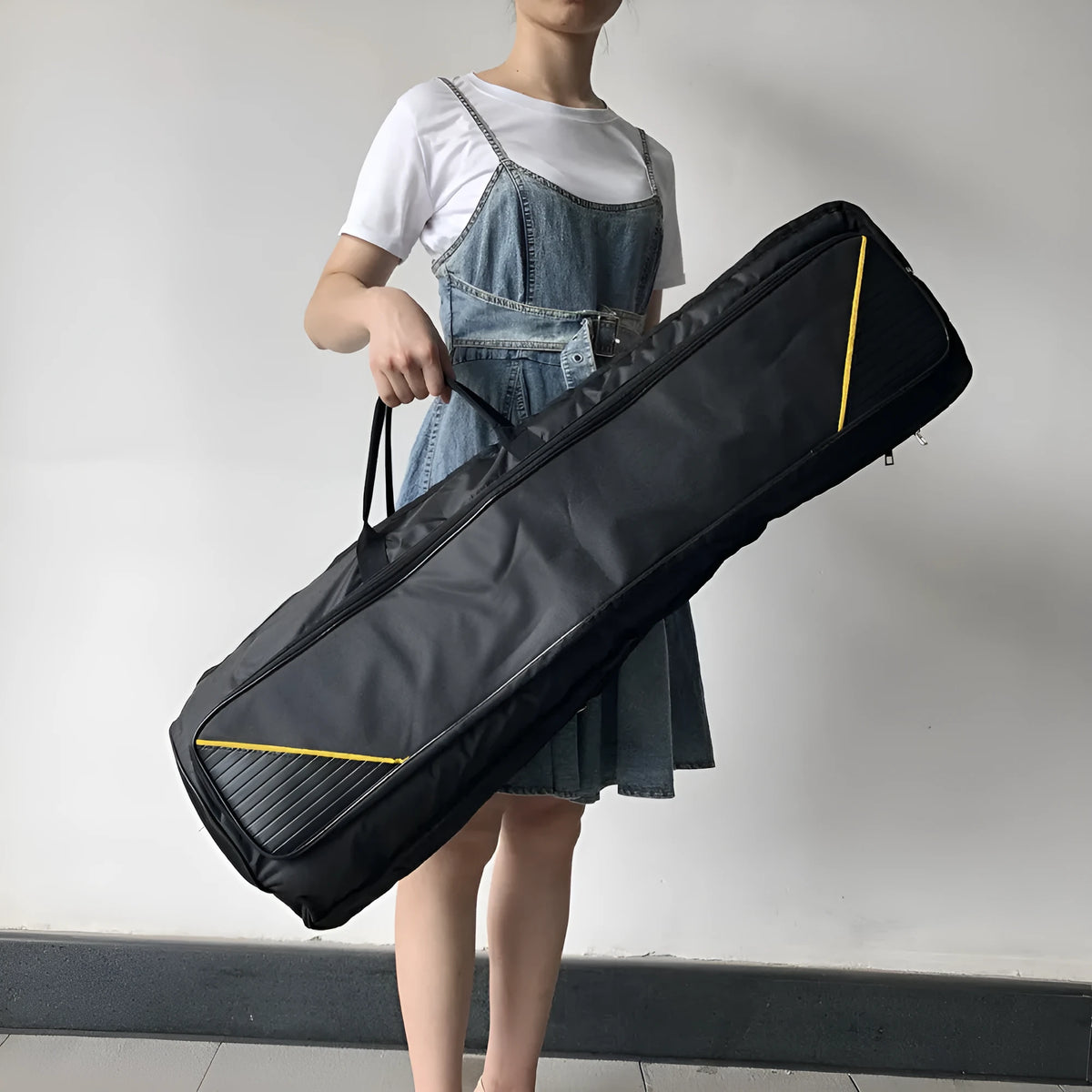 Black tenor trombone bag made of Oxford cloth with padded interior and outer pocket