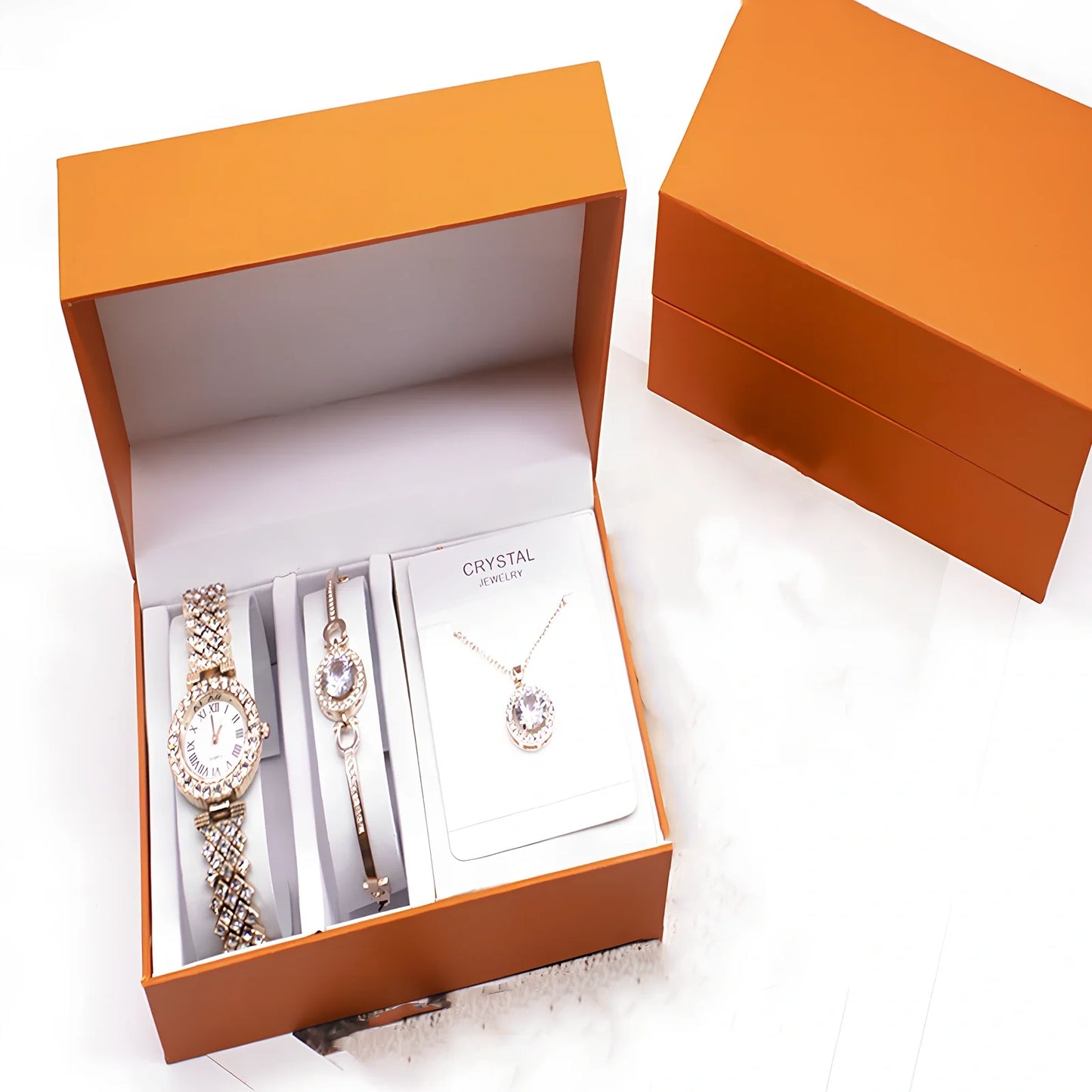 3-piece rhinestone quartz watch set with 22.5cm gold alloy strap, bracelet, and necklace on display