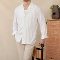 Cotton and linen thin embroidery Cuban collar long sleeve sunscreen shirt in white on a plain background