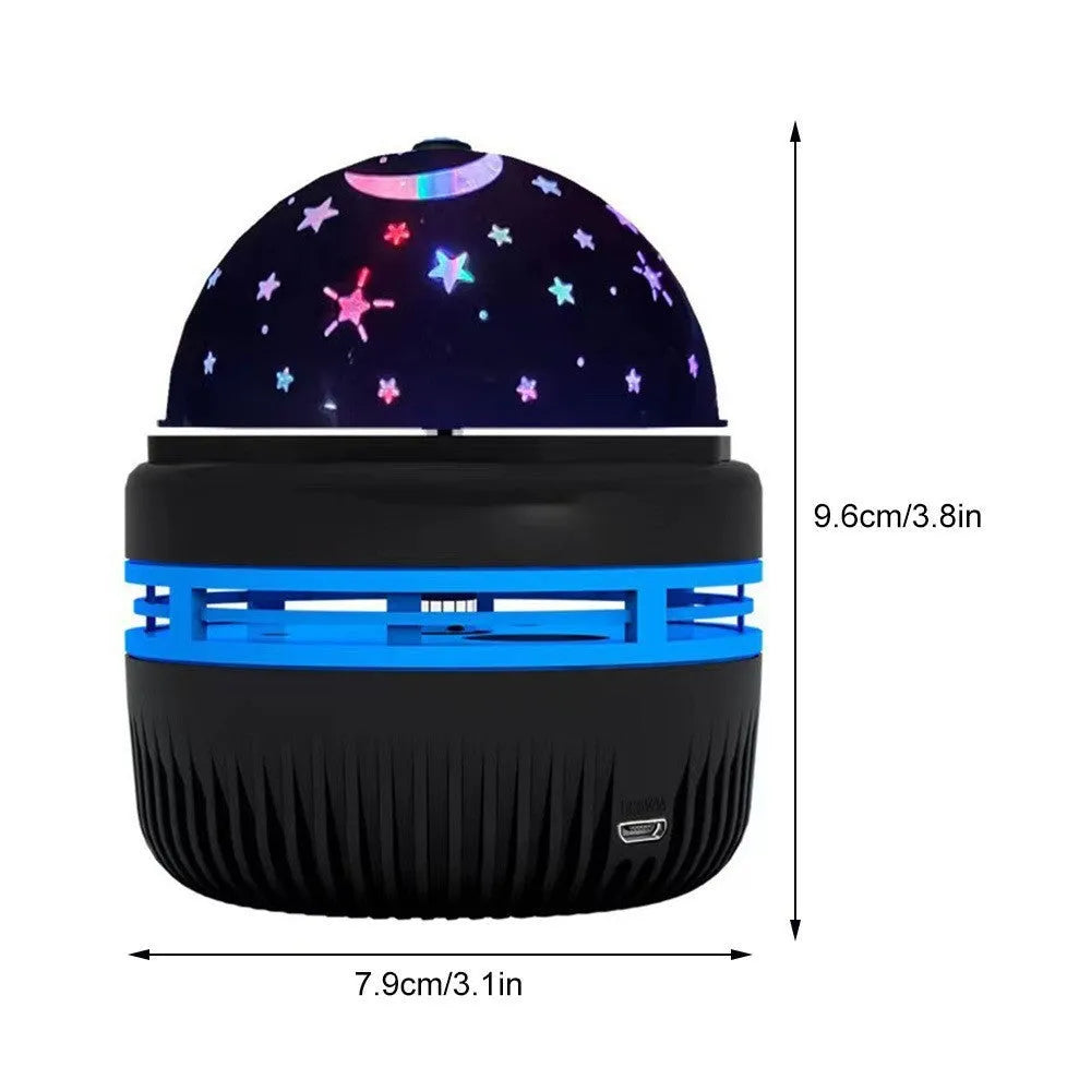 Compact USB-powered LED galaxy projector lamp with remote control on a table