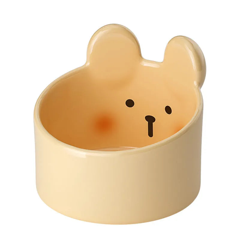 Blush Critter ceramic pet food bowl in white rabbit design, showing raised neck protection ring.