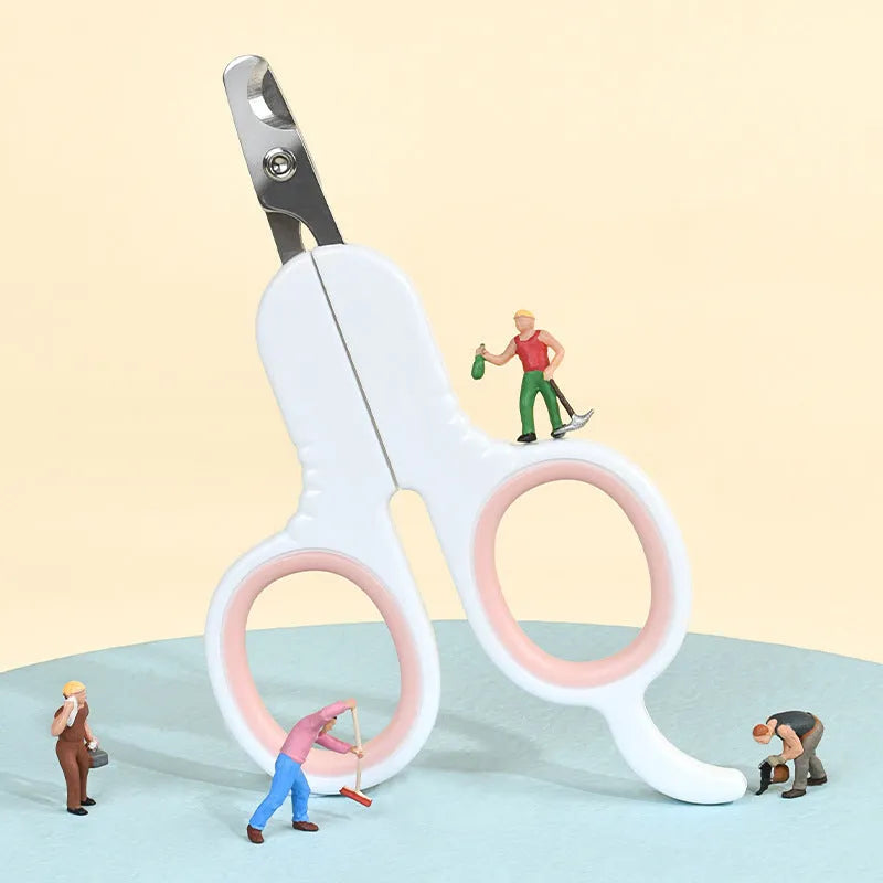Professional grey and pink pet nail clippers with curved blade tips and ergonomic rubber handles.
