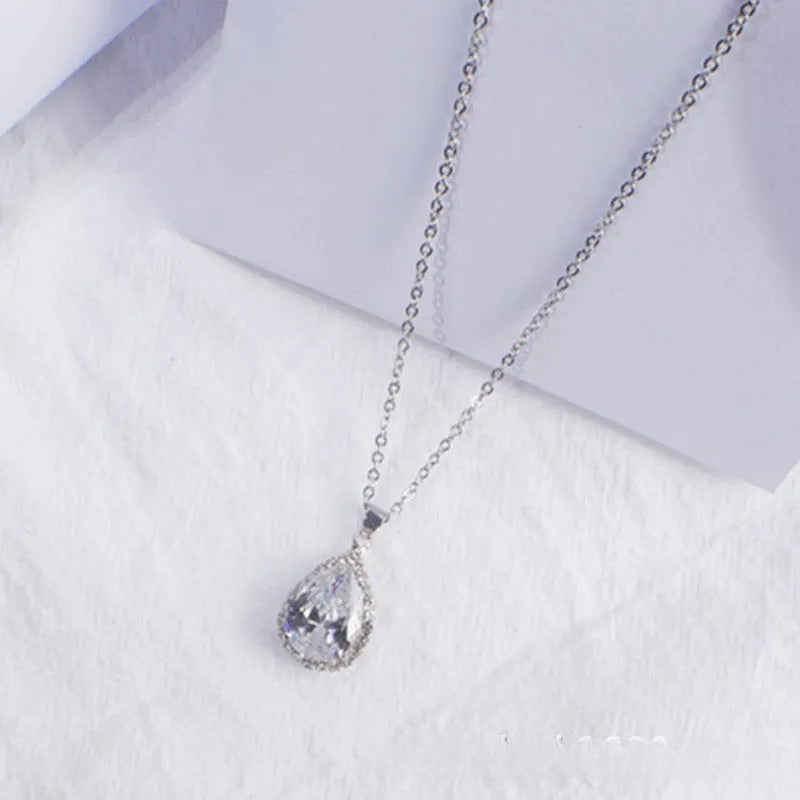 Women's alloy drop necklace with geometric rhinestone pattern in pink rose gold colour