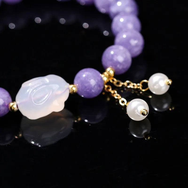 Purple geometric aquamarine and agate bracelet with round beads in handcrafted design