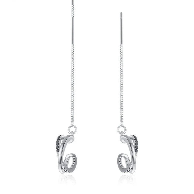 Black geometric tassel ear clips made from durable copper, lightweight design