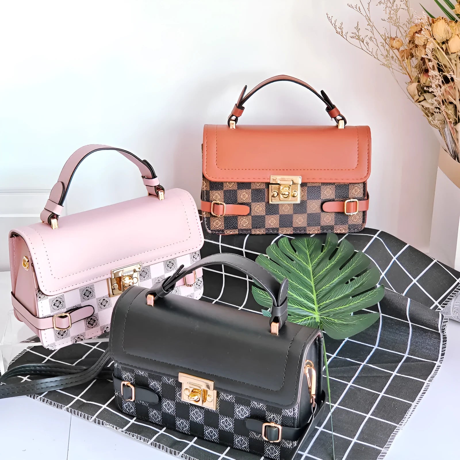 Small square retro patterned crossbody bag in PU leather with a file compartment inside.