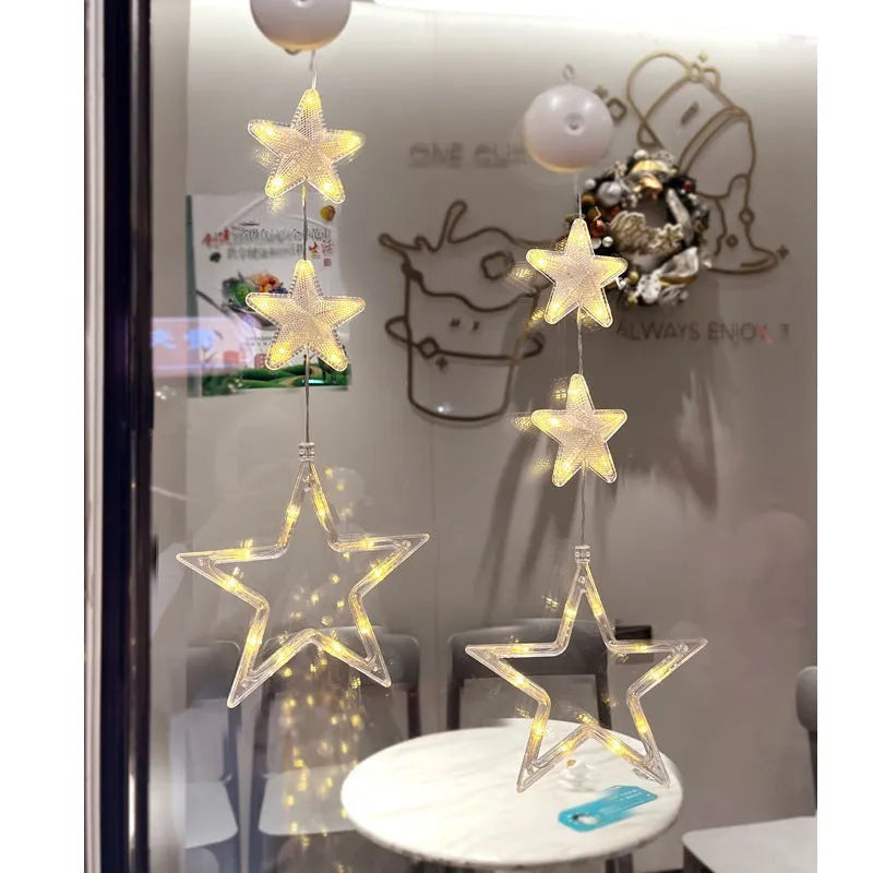 Set of three battery-powered LED Christmas pendant lights with suction cups for window decoration
