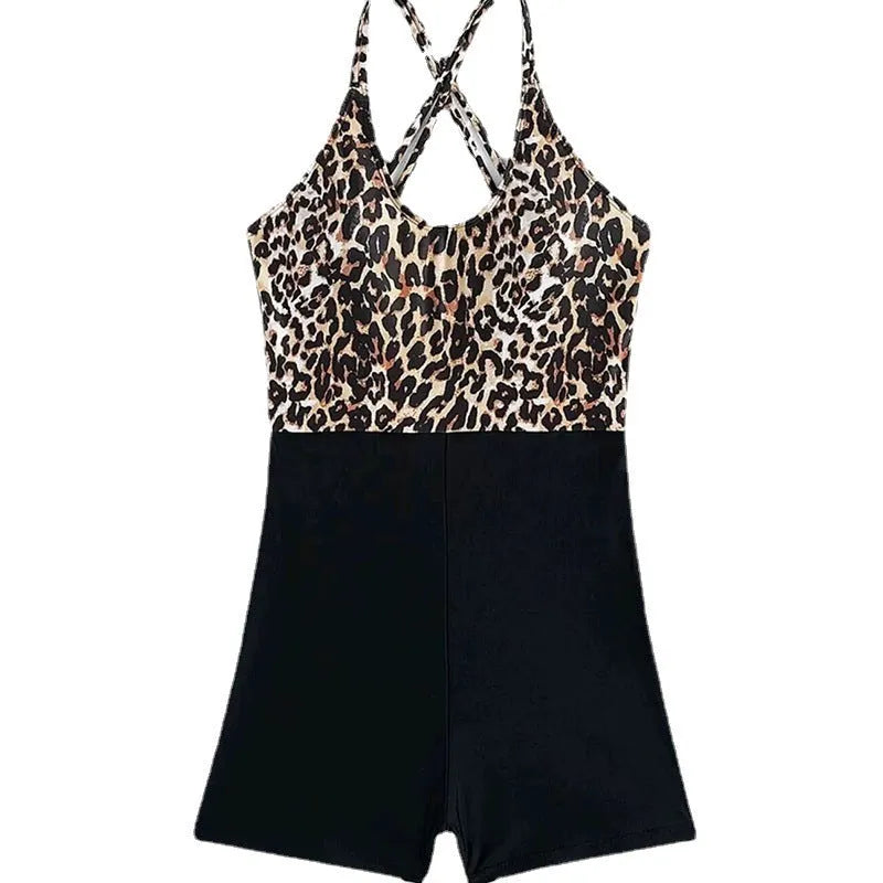 Women's one-piece leopard print crossover lace up slimming hip swimsuit in black and white leopard print