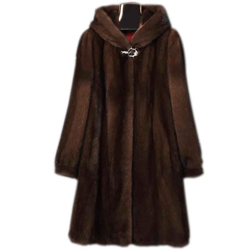 Women's long black faux fur hooded coat for winter street fashion wear.