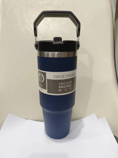 Insulated stainless steel travel tumbler with double-wall vacuum technology, sweat-proof powder coating, and BPA-free sliding lid for hot and cold drinks on the go.