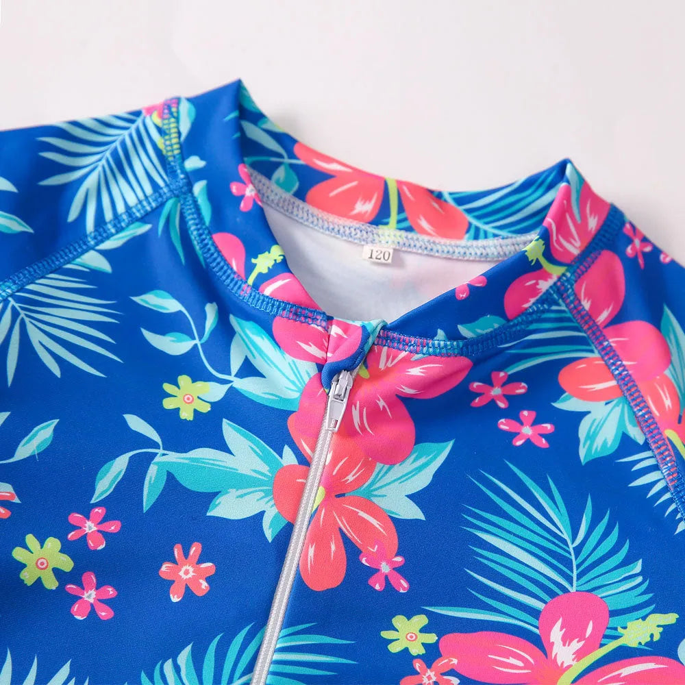 Girl's long-sleeve one-piece swimming suit in briefs style made from polyester fabric