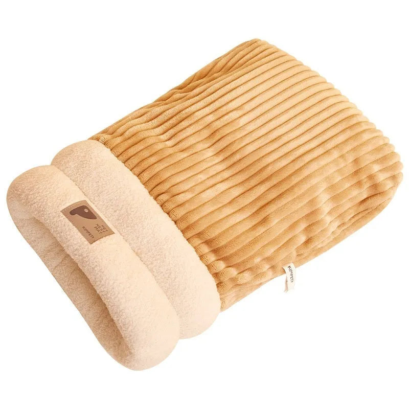 Brown semi-enclosed pet sleeping bag with lambswool insulation on wooden floor