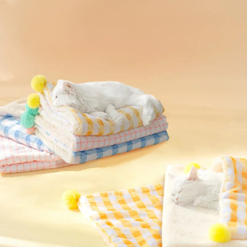 Blue coral fleece pet blanket showing soft texture, laid flat to show size.