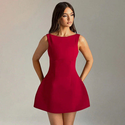 Stylish backless mini dress in various colors, featuring a high-waisted, sleeveless design perfect for warm weather wear.