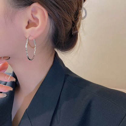 Geometric alloy earrings in gold and silver finishes