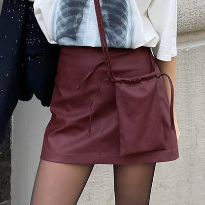 Wine red matte leather A-line skirt with concealed zipper and micro elastic waistband