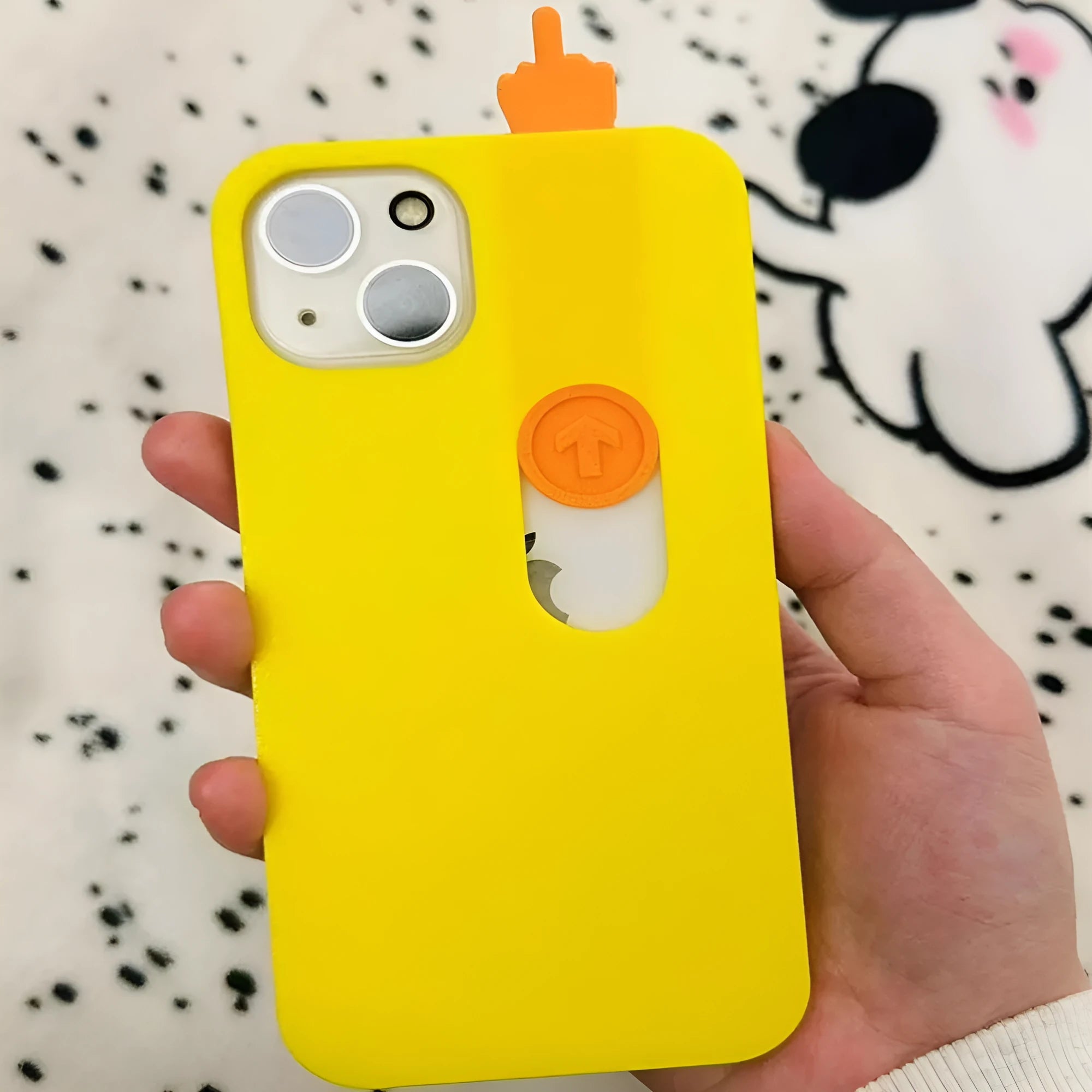 3D printed sliding middle finger phone case in bright yellow for iPhone 15 Pro Max with fall protection