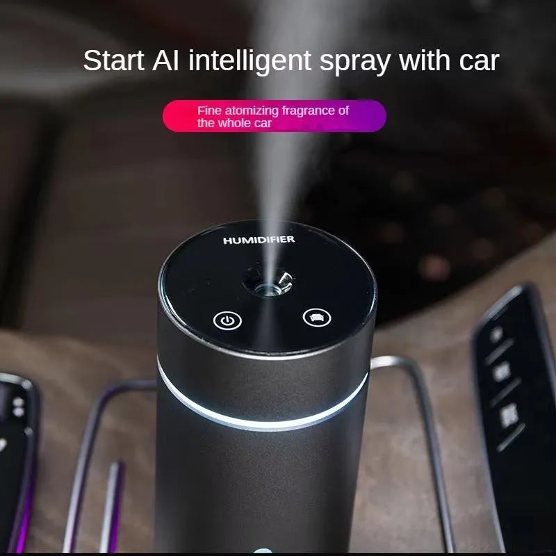 Aluminium portable car air humidifier and essential oil diffuser with coloured night light on.