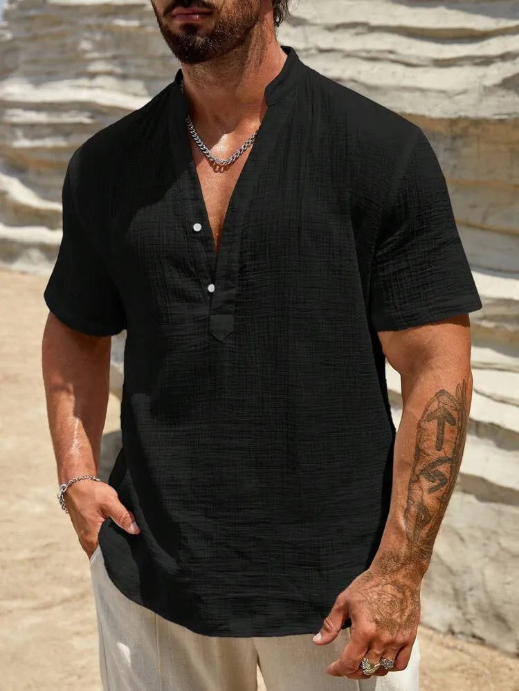 Men's solid colour short-sleeved shirt with a stand collar on a hanger.