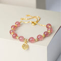 Strawberry quartz electroplated crystal bracelet with geometric fu charm
