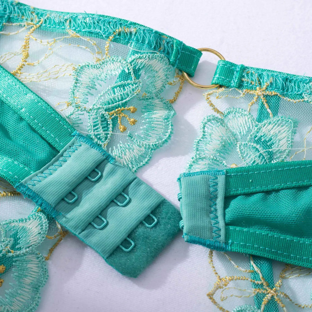 Light green women's embroidery bra set with three-point tights design showing SML size options
