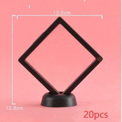 3D floating jewelry display stand showcasing earrings and coins in mid-air