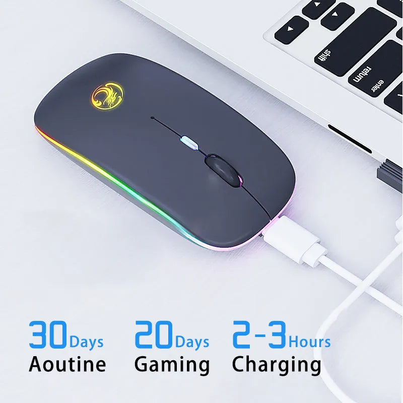 Black and white luminous charging Bluetooth dual-mode wireless silent mouse on a desk.
