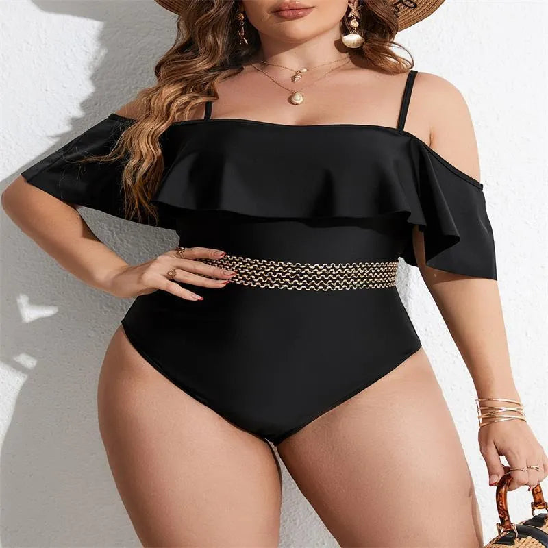 Black women's one-piece swimsuit on hanger, plus size range 0XL to 4XL.