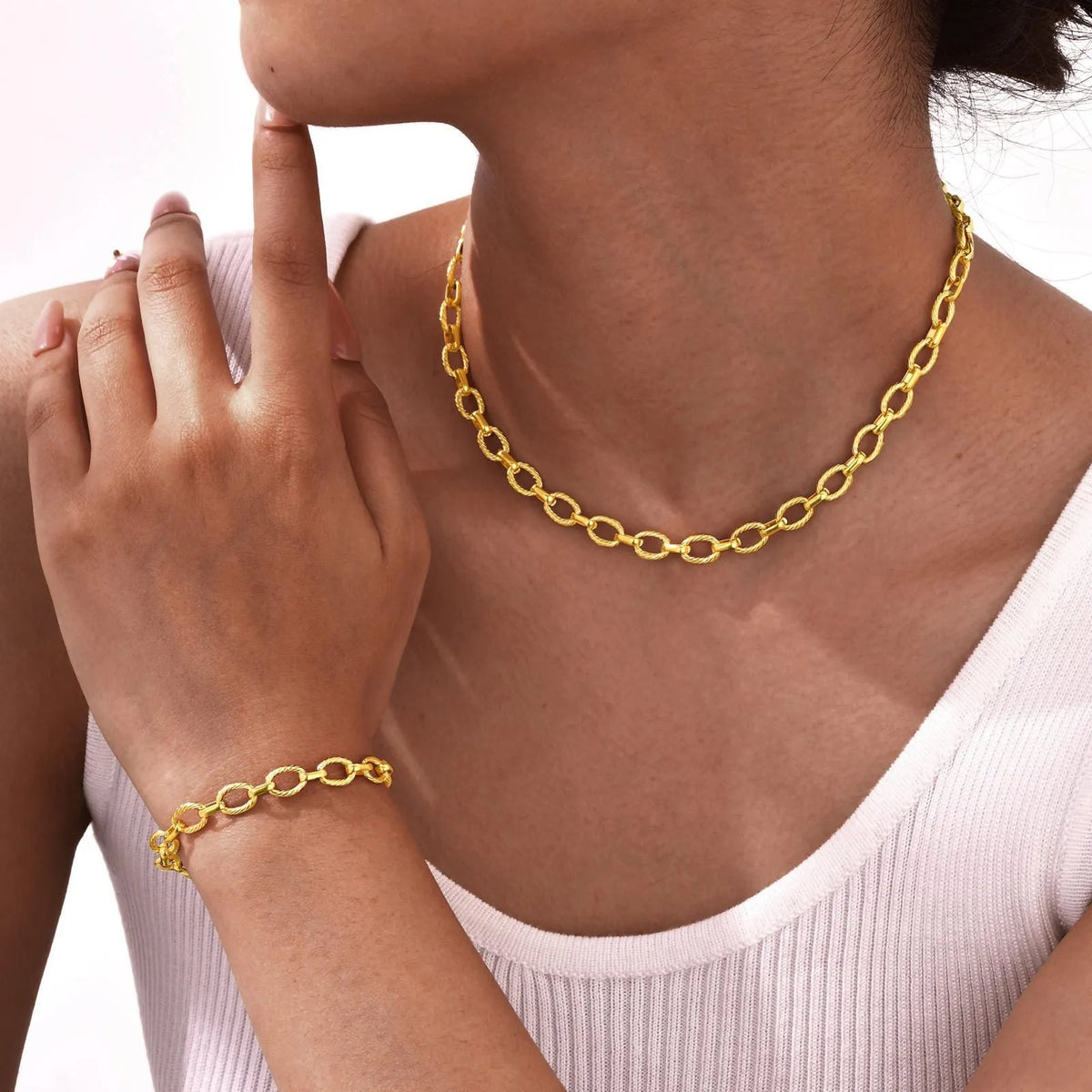 Gold electroplated stainless steel geometric embossed necklace and bracelet set for women