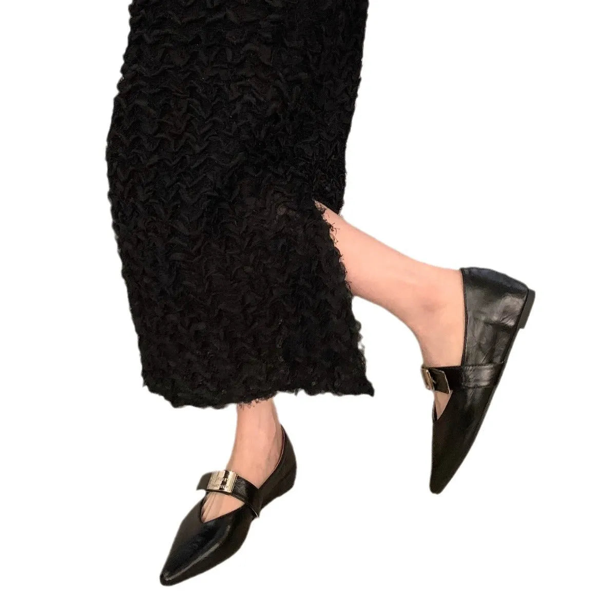 Women's silver Mary Jane shoes with pointed toe, buckle fastening, and low heel